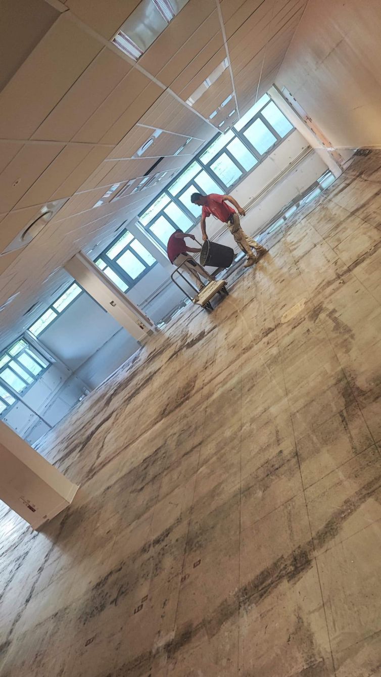 Reagreage avant pose de dalles moquette - 1